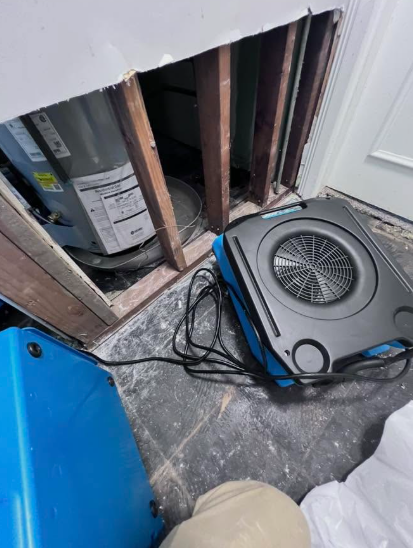 Drying equipment running in a water damaged home